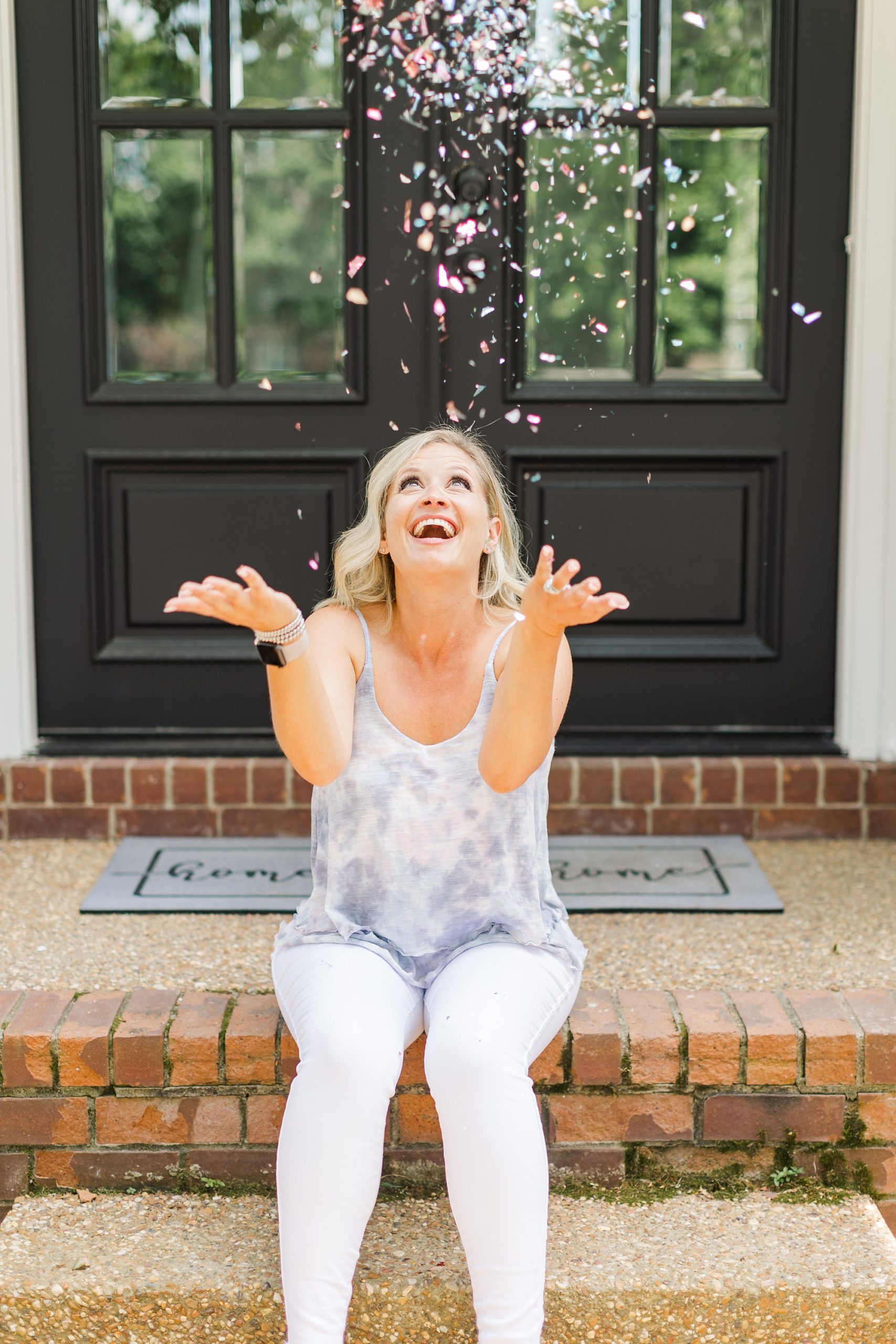 Disney planner throws confetti on front steps of home
