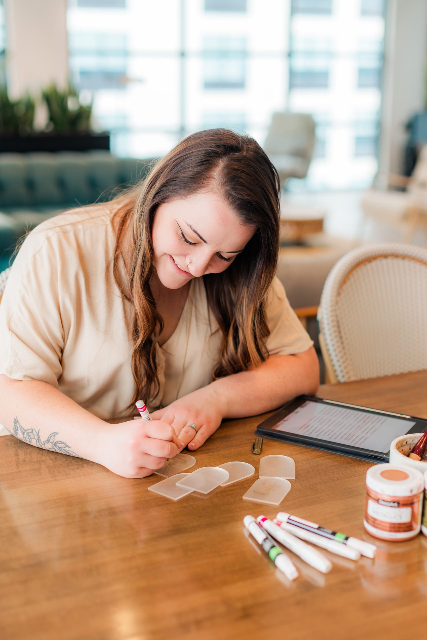 woman does calligraphy during Nashville branding session