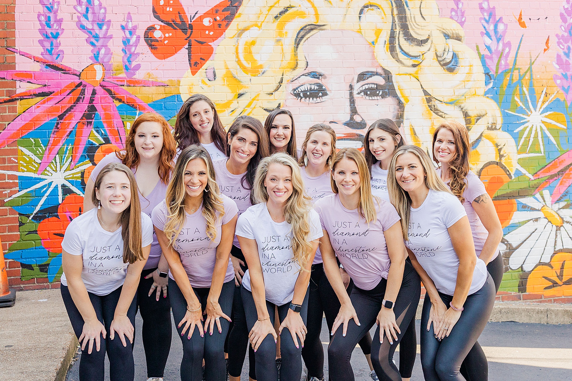 women pose outside of Dolly mural in Nashville TN
