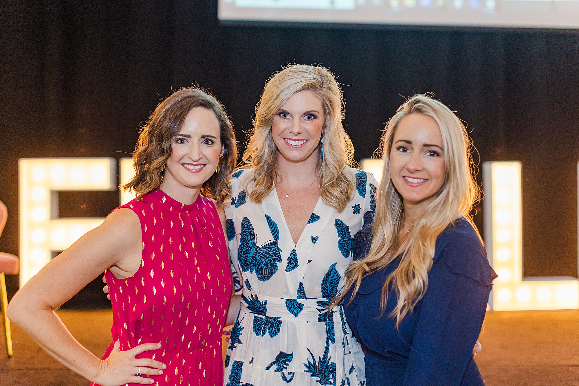 three women pose together during Tennessee Women Connect Live Event
