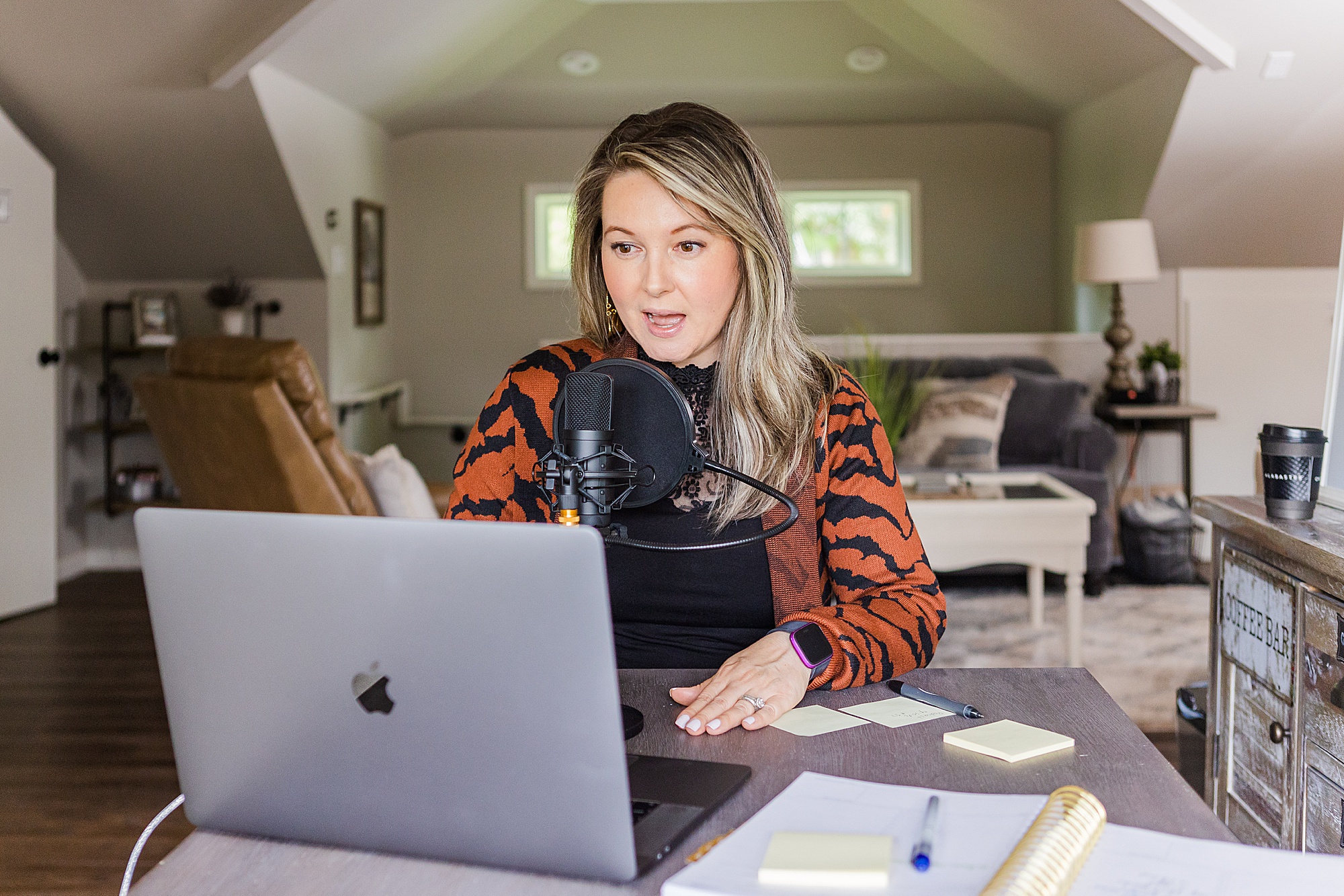 woman works on podcast during branding session in Franklin TN
