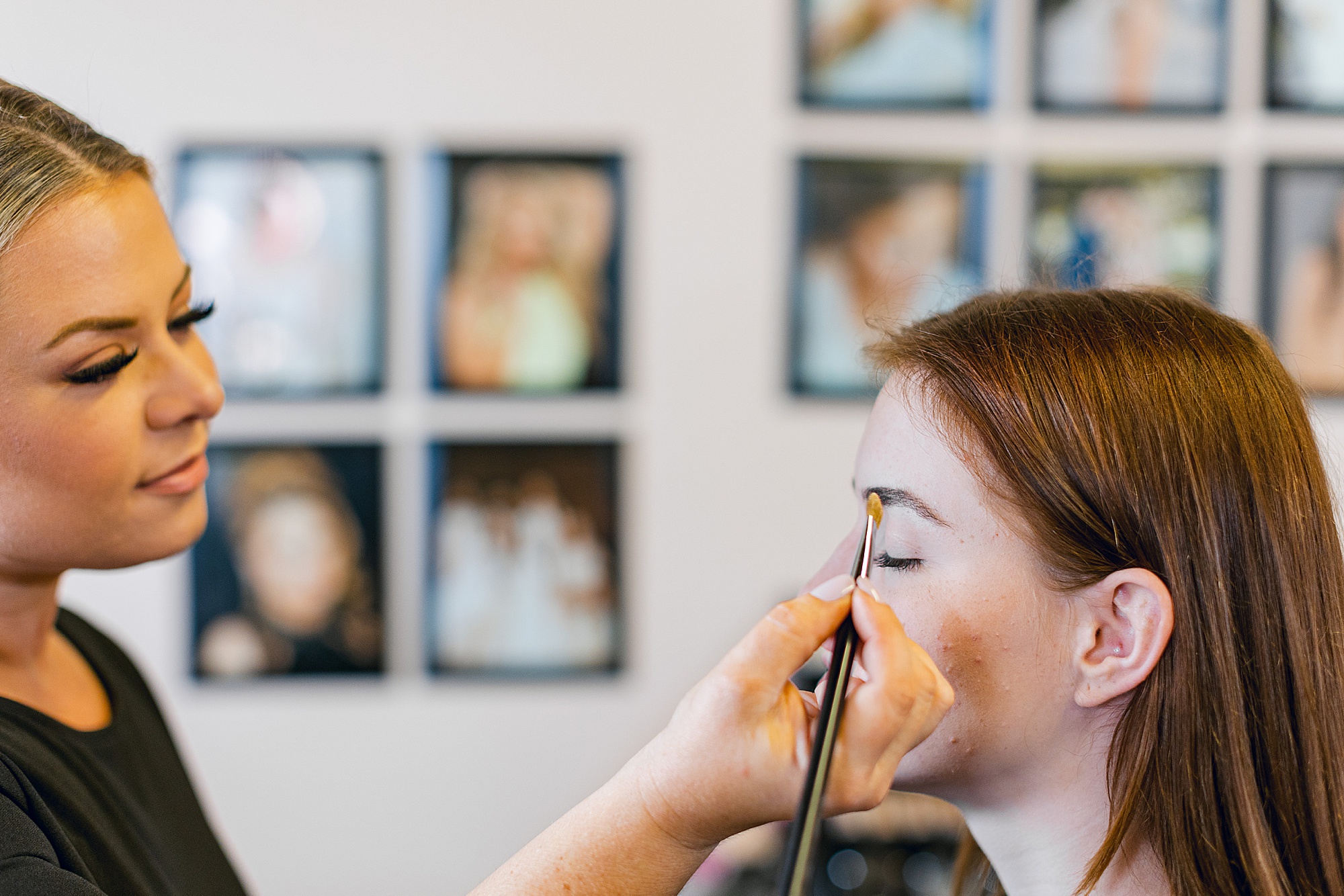 Nashville esthetician and beauty expert works on client's eyebrows