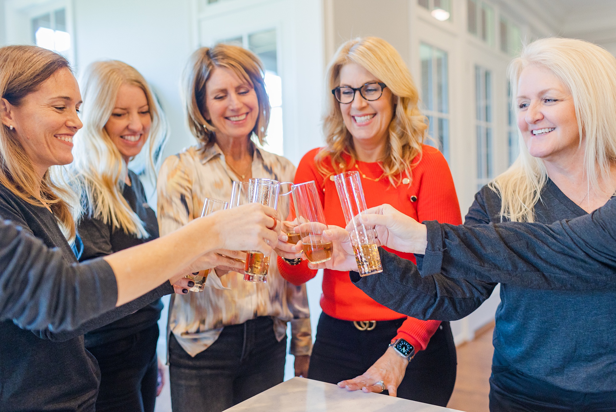 women toast champagne during Brentwood TN branding session