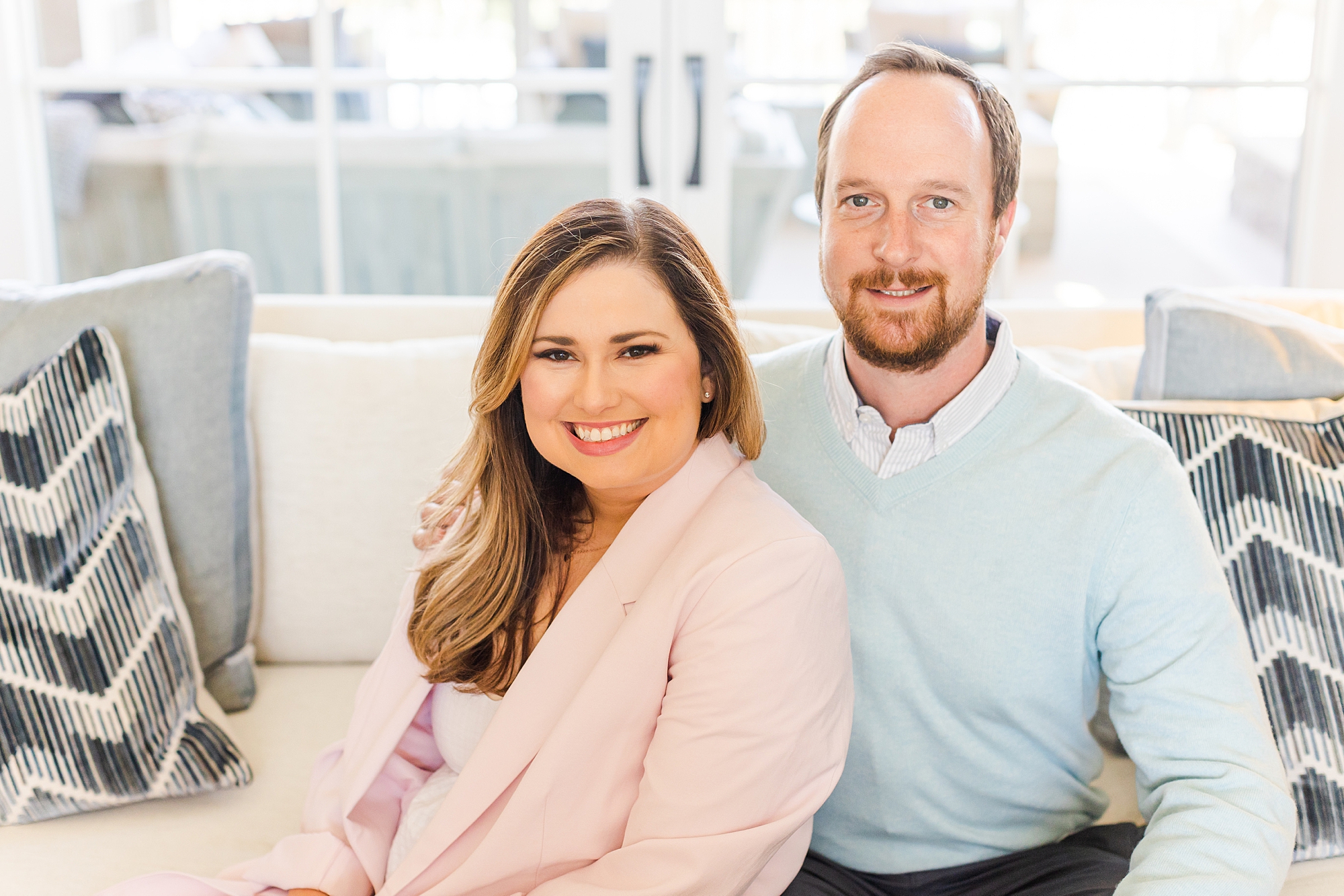 couple sits together on couch during branding session in Brentwood TN