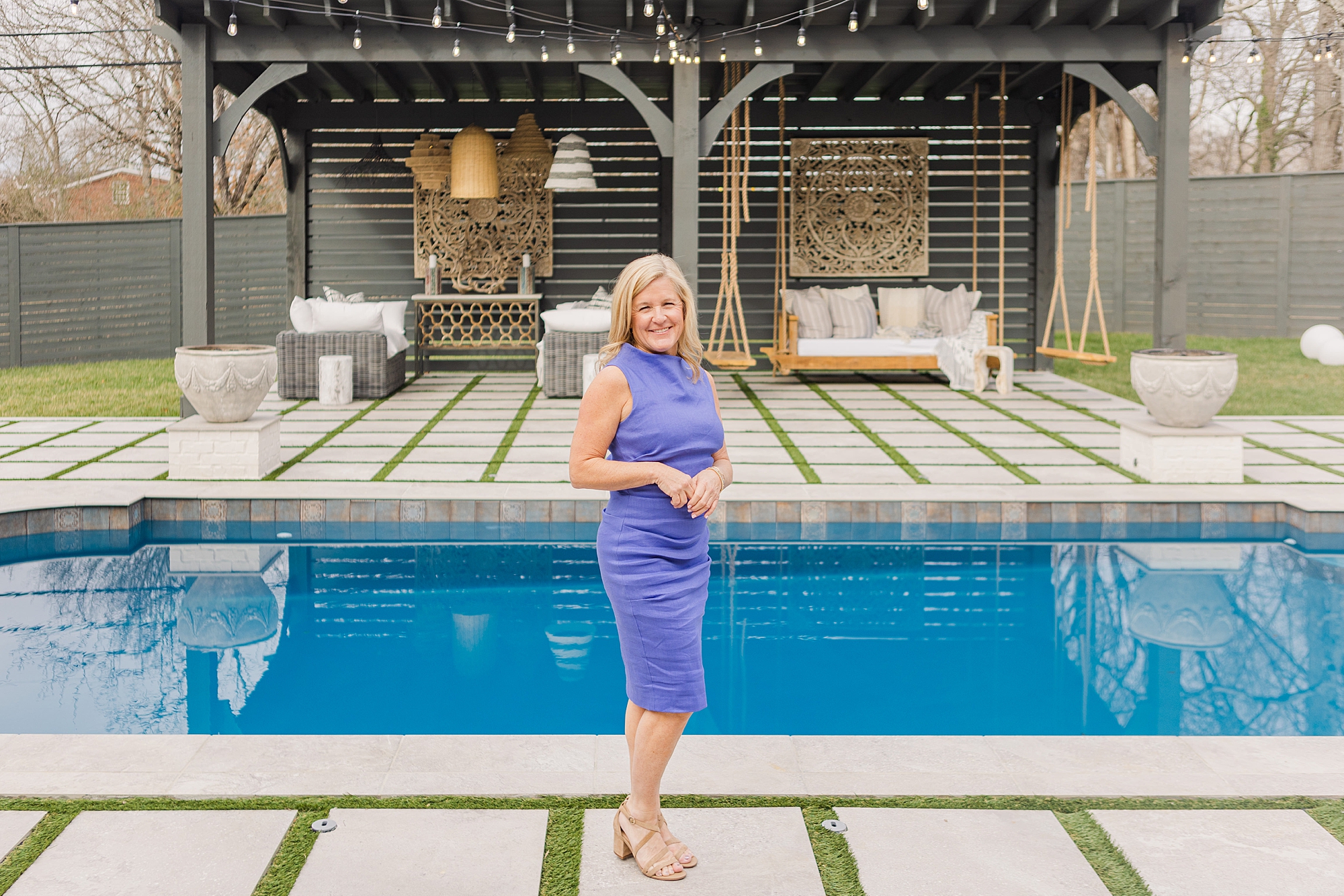 woman poses by pool during Bellevue TN branding session
