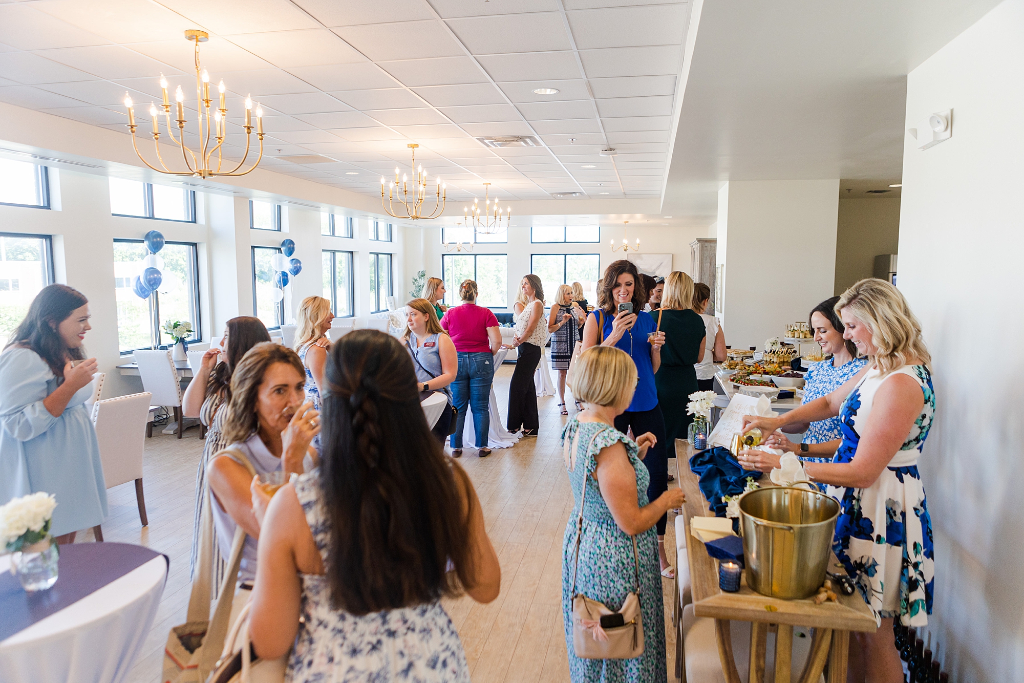 women mingle and talk during networking event