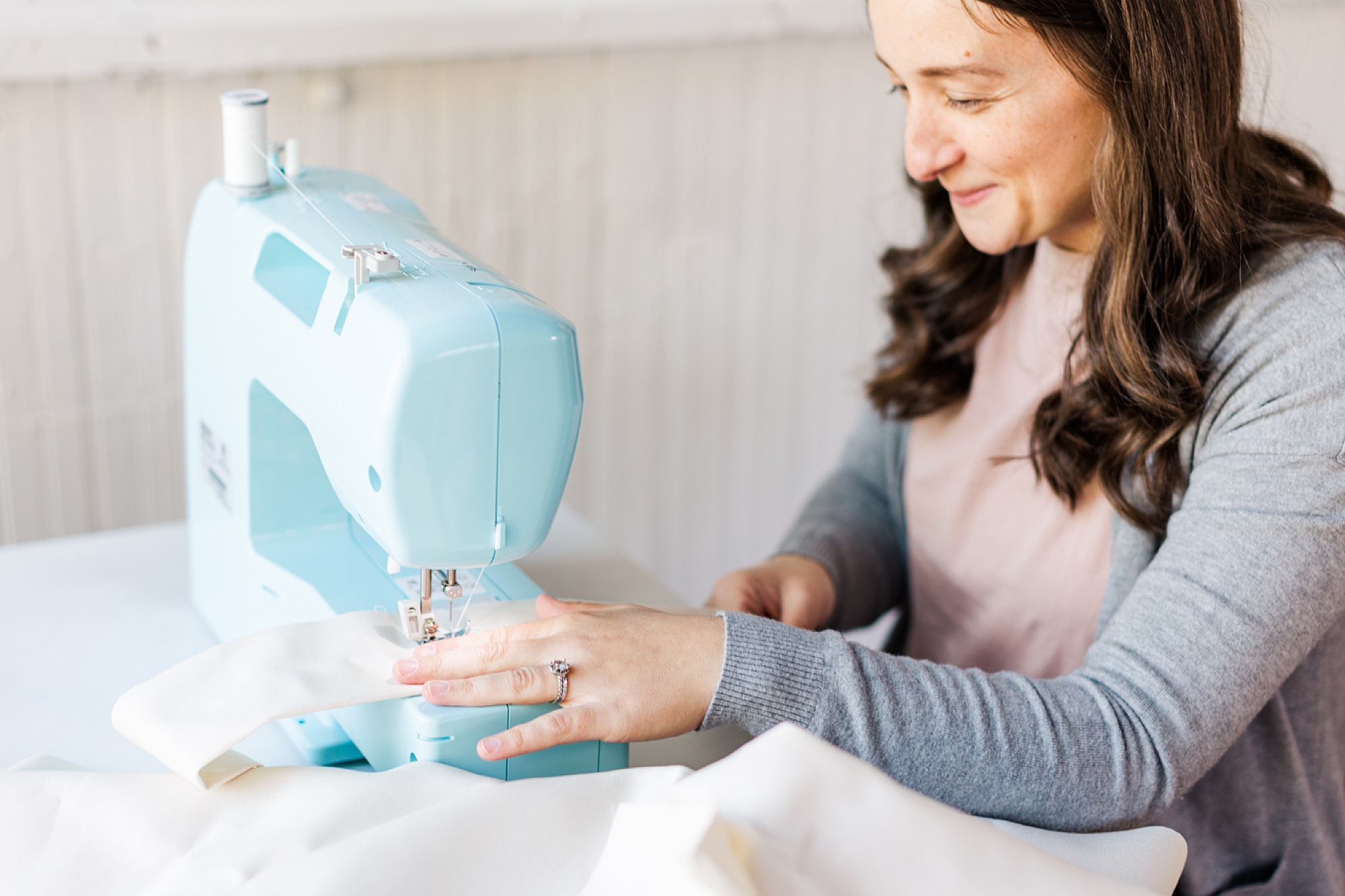 seamstress works during branding photos