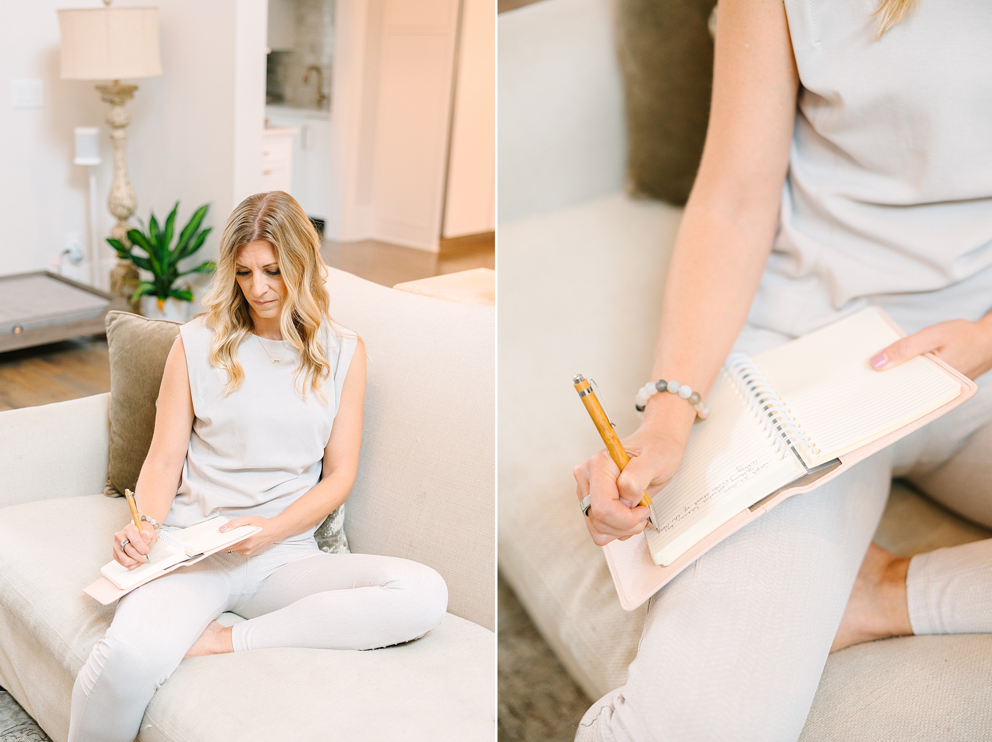health coach writes in planner on couch during at home Nashville branding portraits