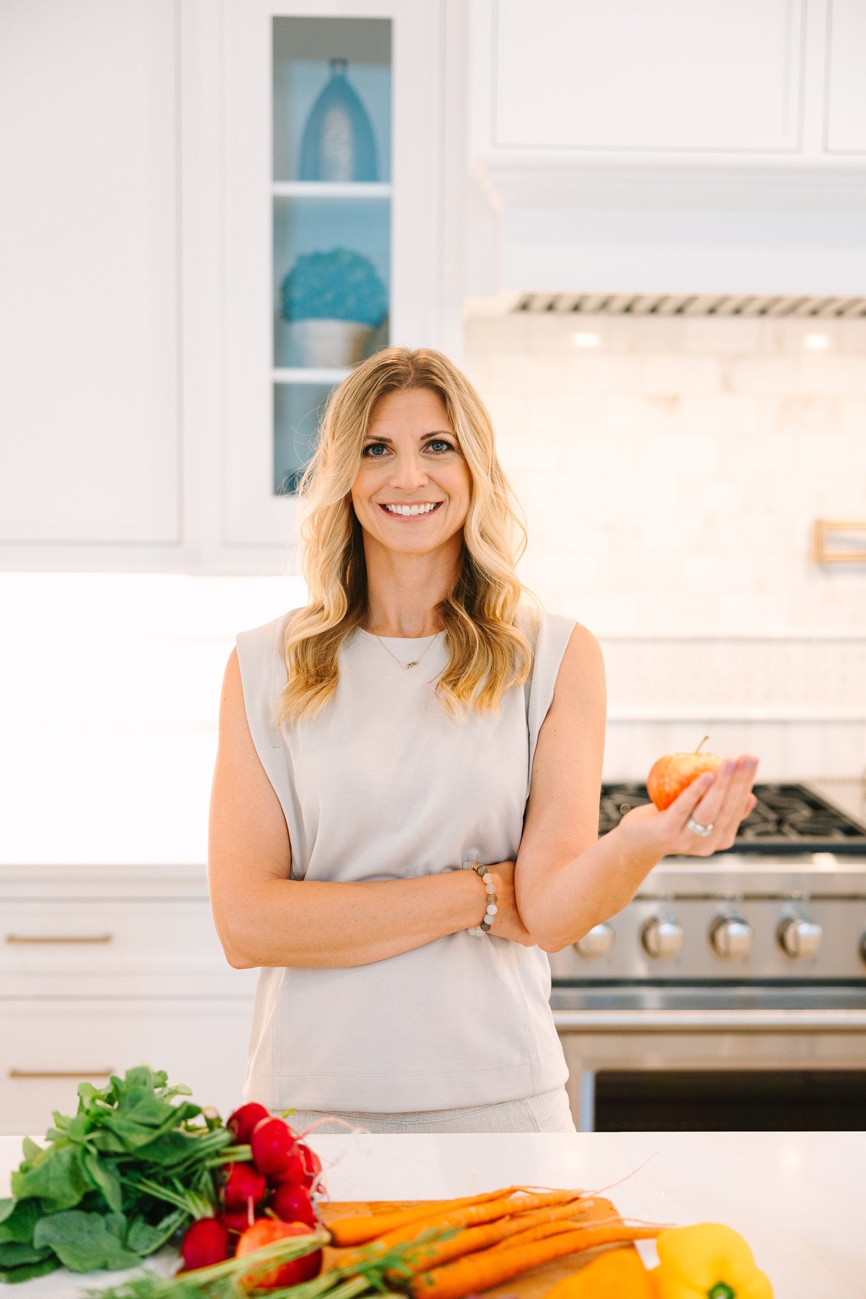 woman stands in kitchen during Nashville branding portraits