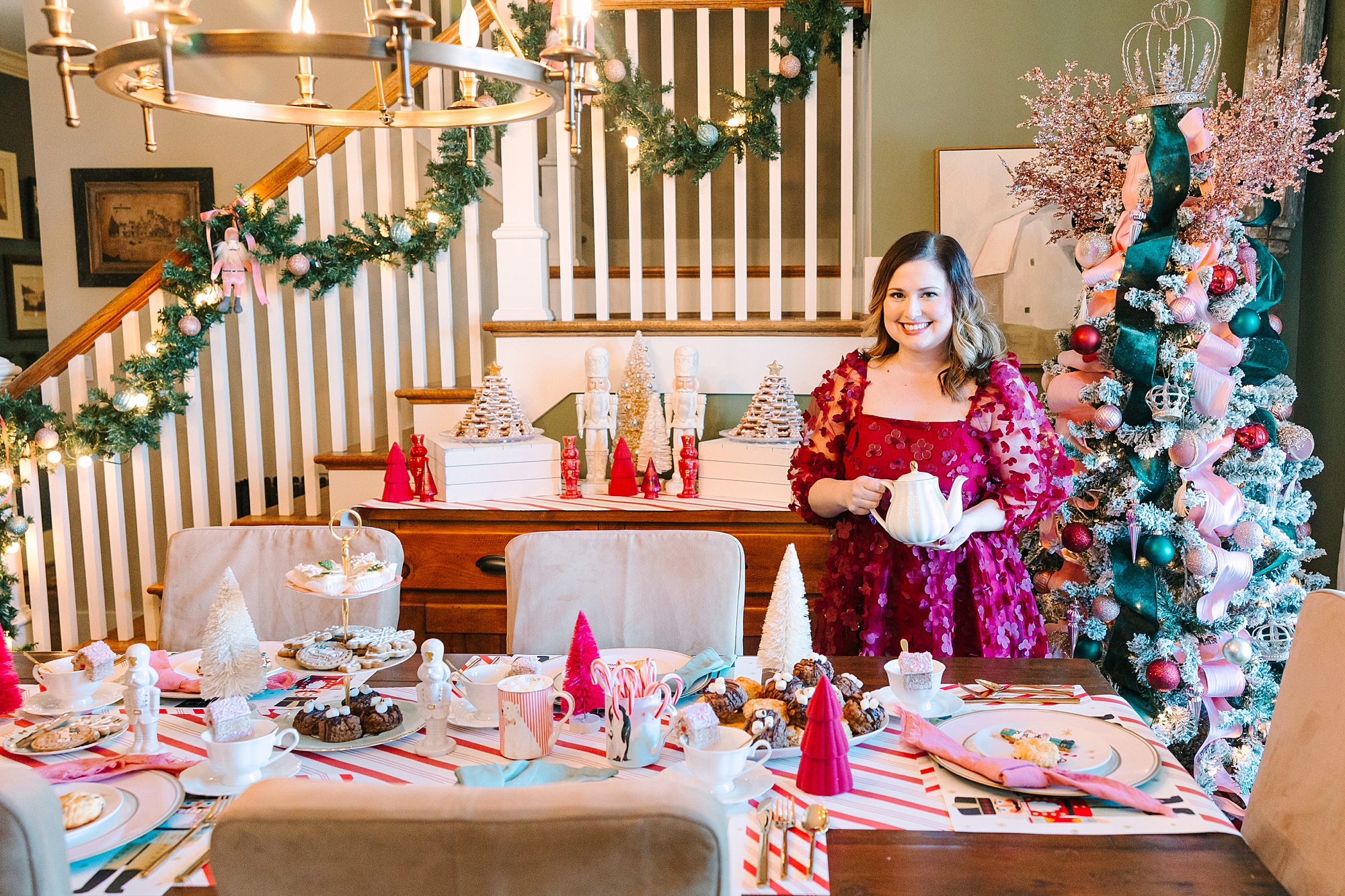 business owner stands by table during Nutcracker inspired tea party with Pretty Lovely Tea