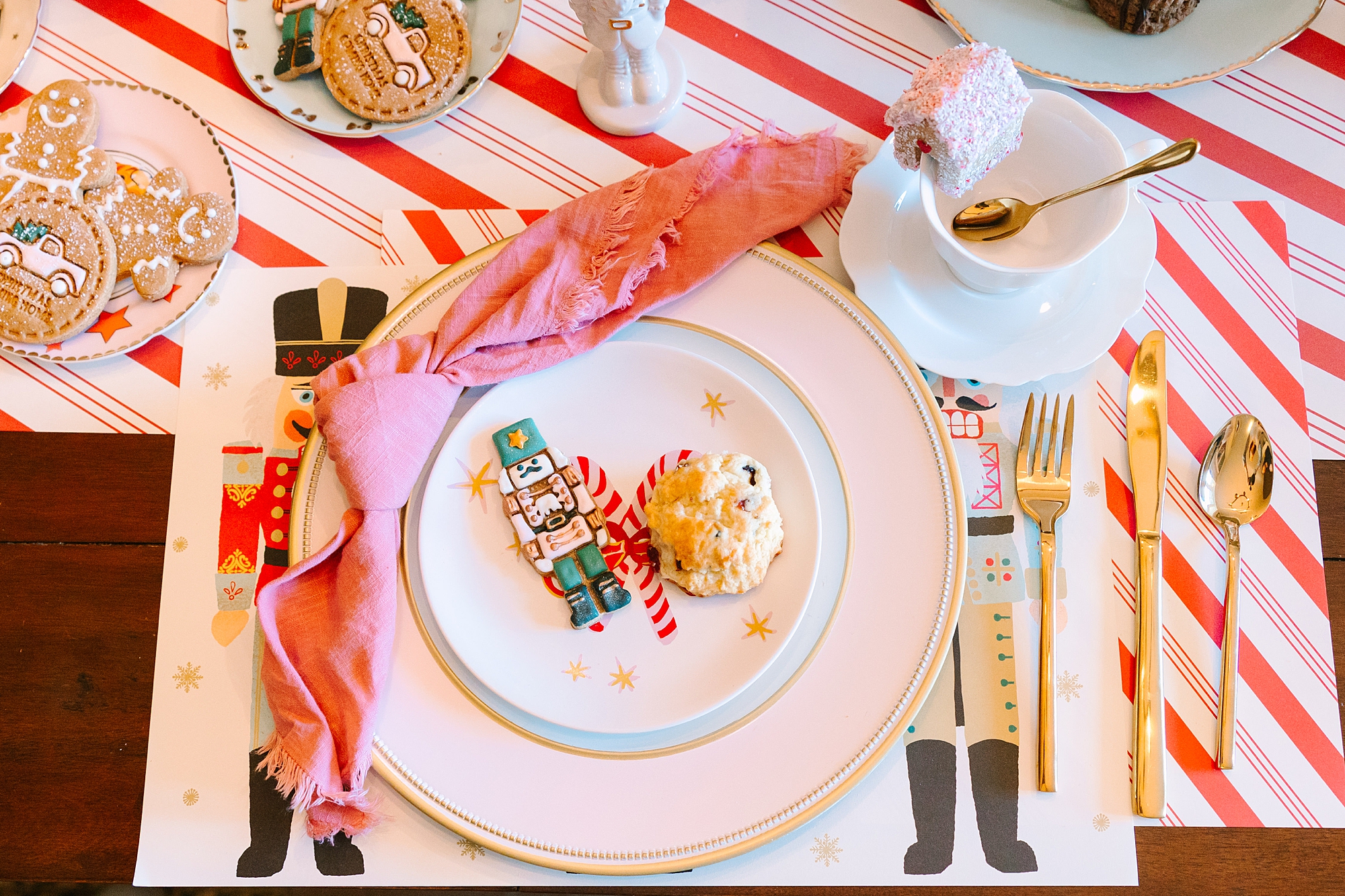 place setting with cookie and custom plates for Nutcracker inspired tea party with Pretty Lovely Tea