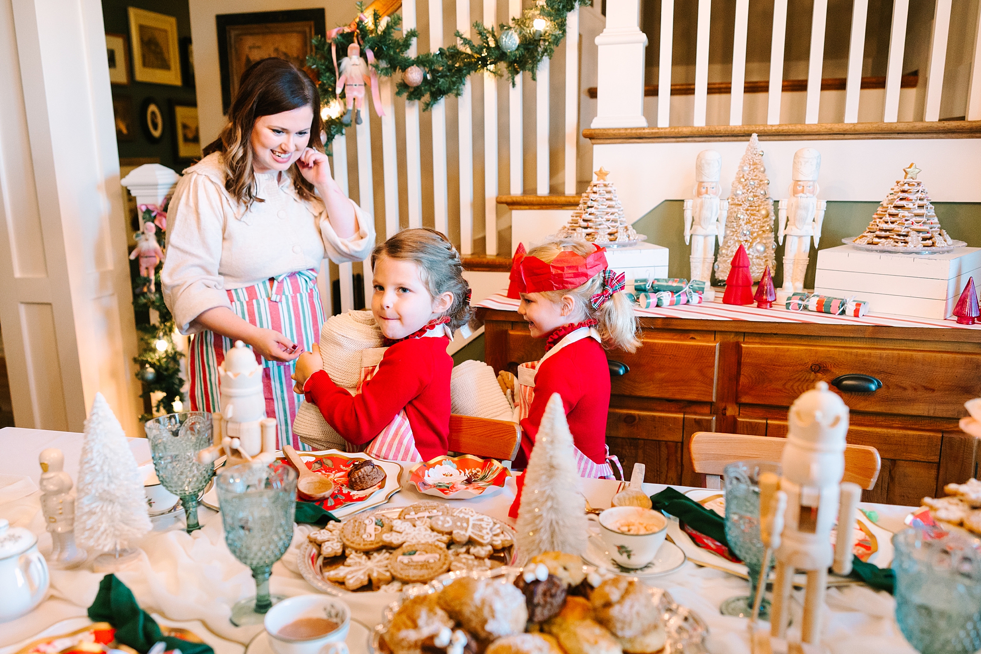 business owner gives girls tea during Nutcracker inspired tea party with Pretty Lovely Tea