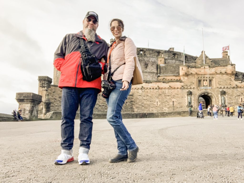 selfie of couple in front of castle in Glasgow 