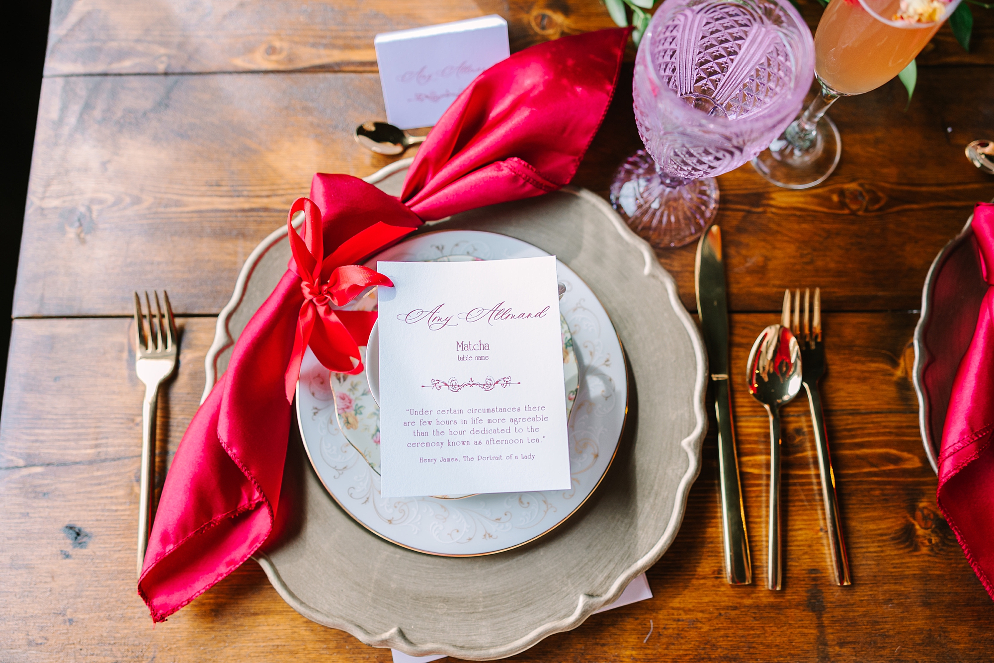 place setting with vintage plates and red napkin for Galentine's Day Tea Party