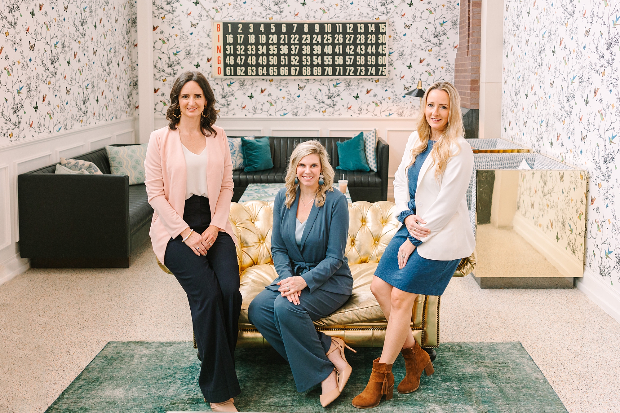 three female CEOs sit on couch at The Graduate Hotel in Nashville TN
