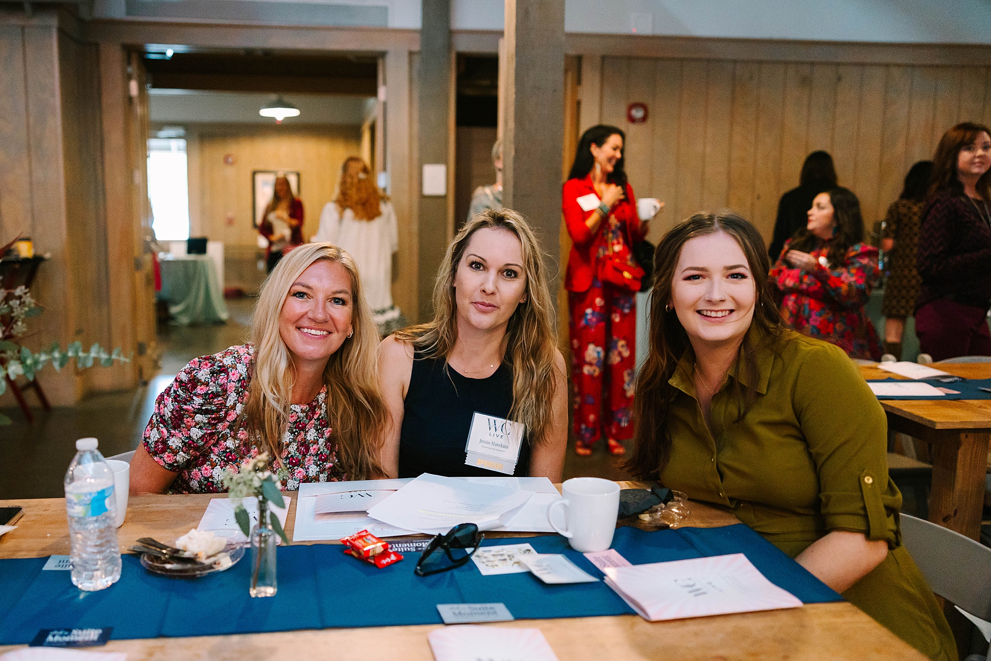 attendees sit together at table during Tennessee Women Connect Live Event
