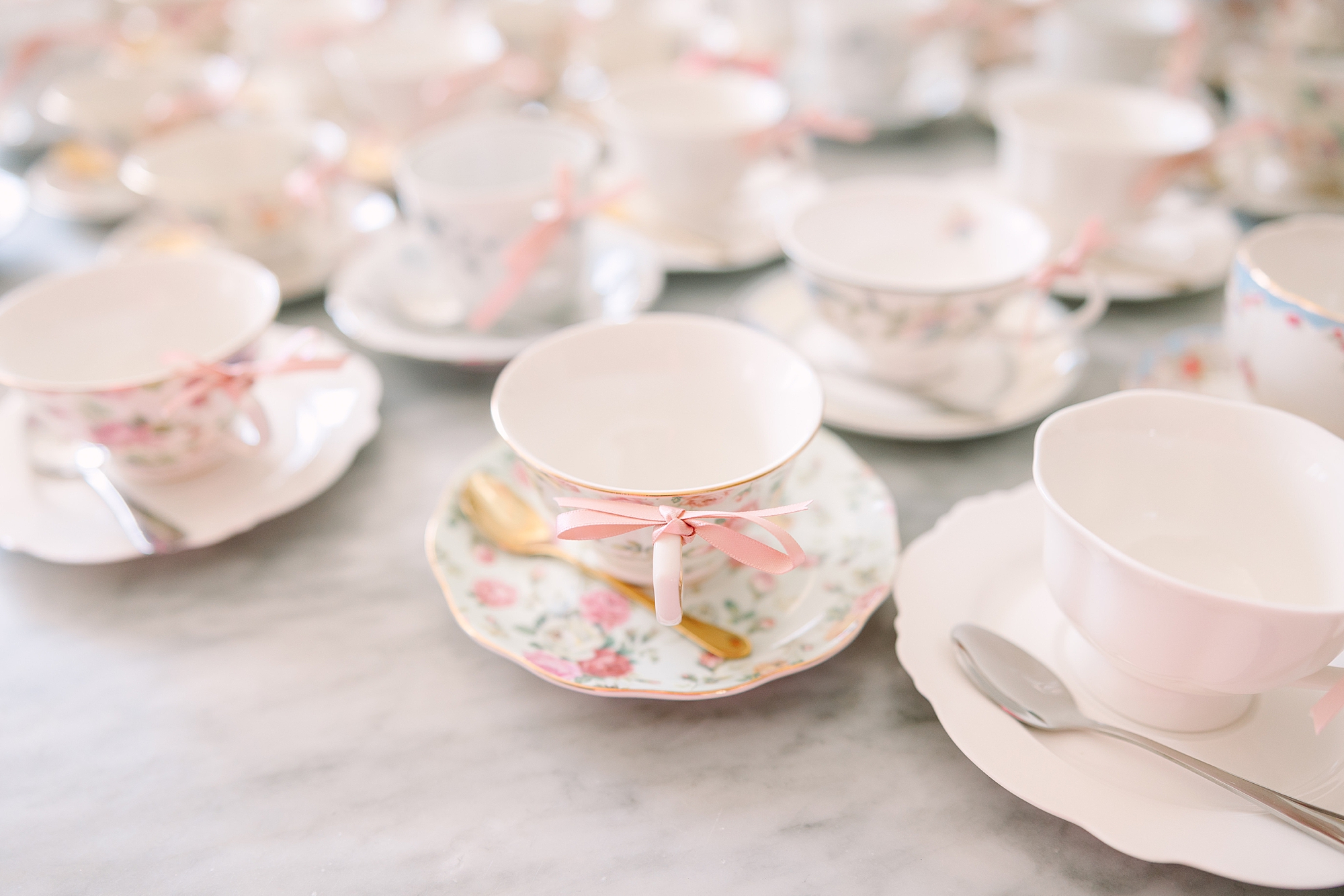 white and pink tea cups for Galentine’s Day Tea at Magnolia Acres with Pretty Lovely Teas