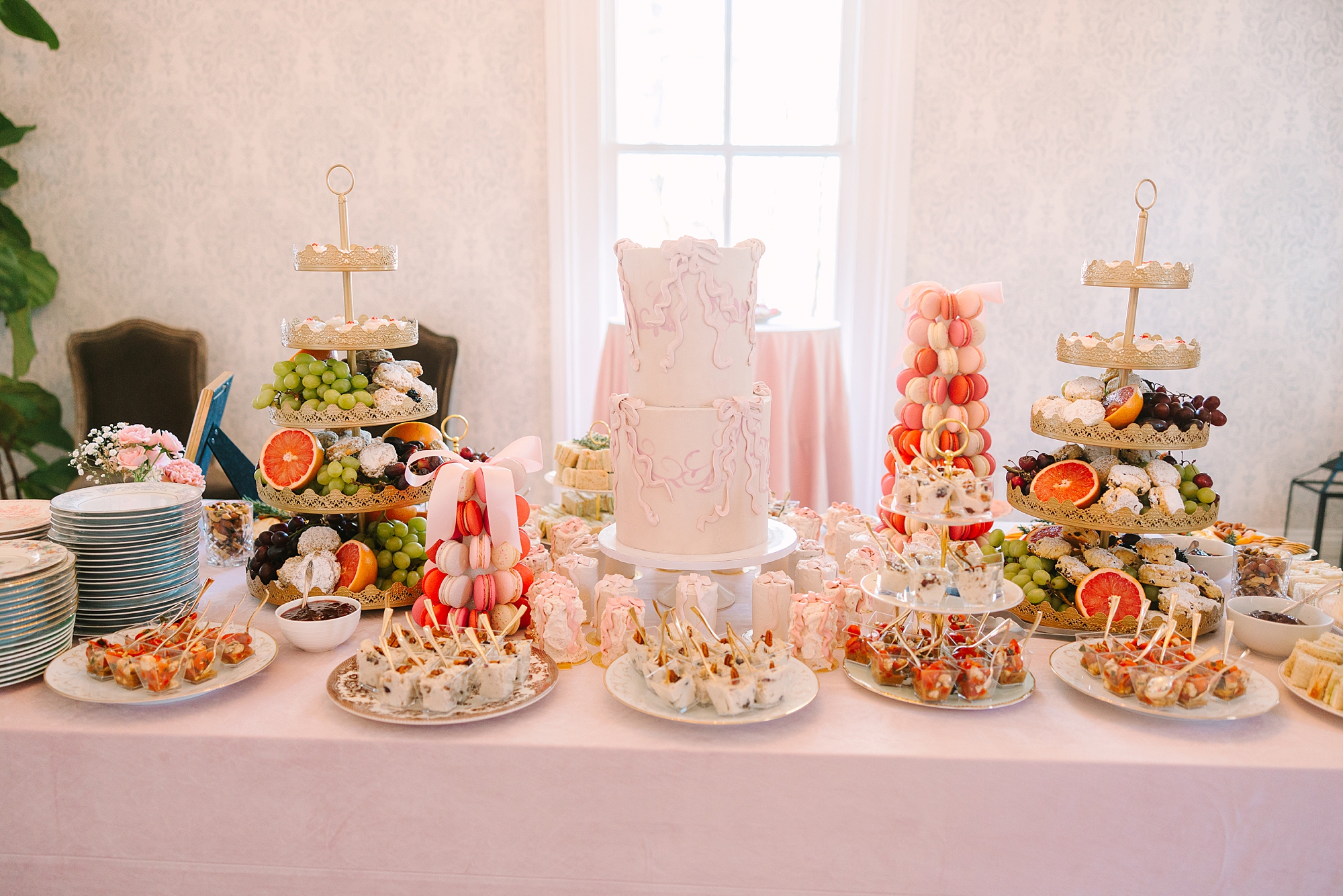dessert display with cake and other desserts at Galentine's Day Tea