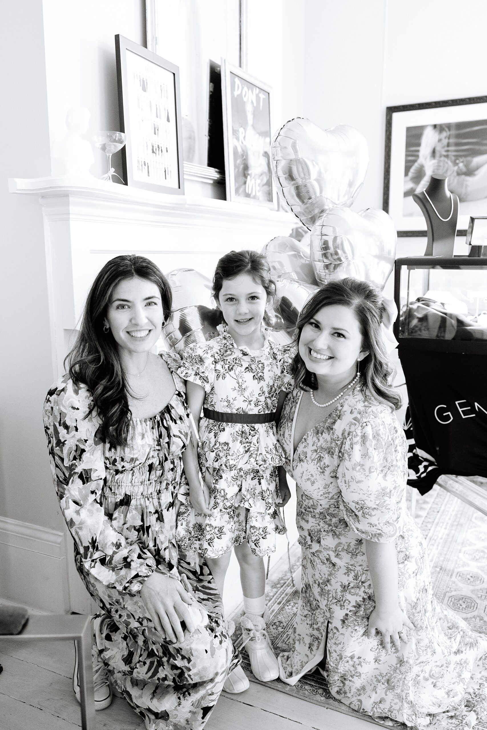 women pose with young girl during Galentine's Day Tea hosted by Pretty Lovely Teas